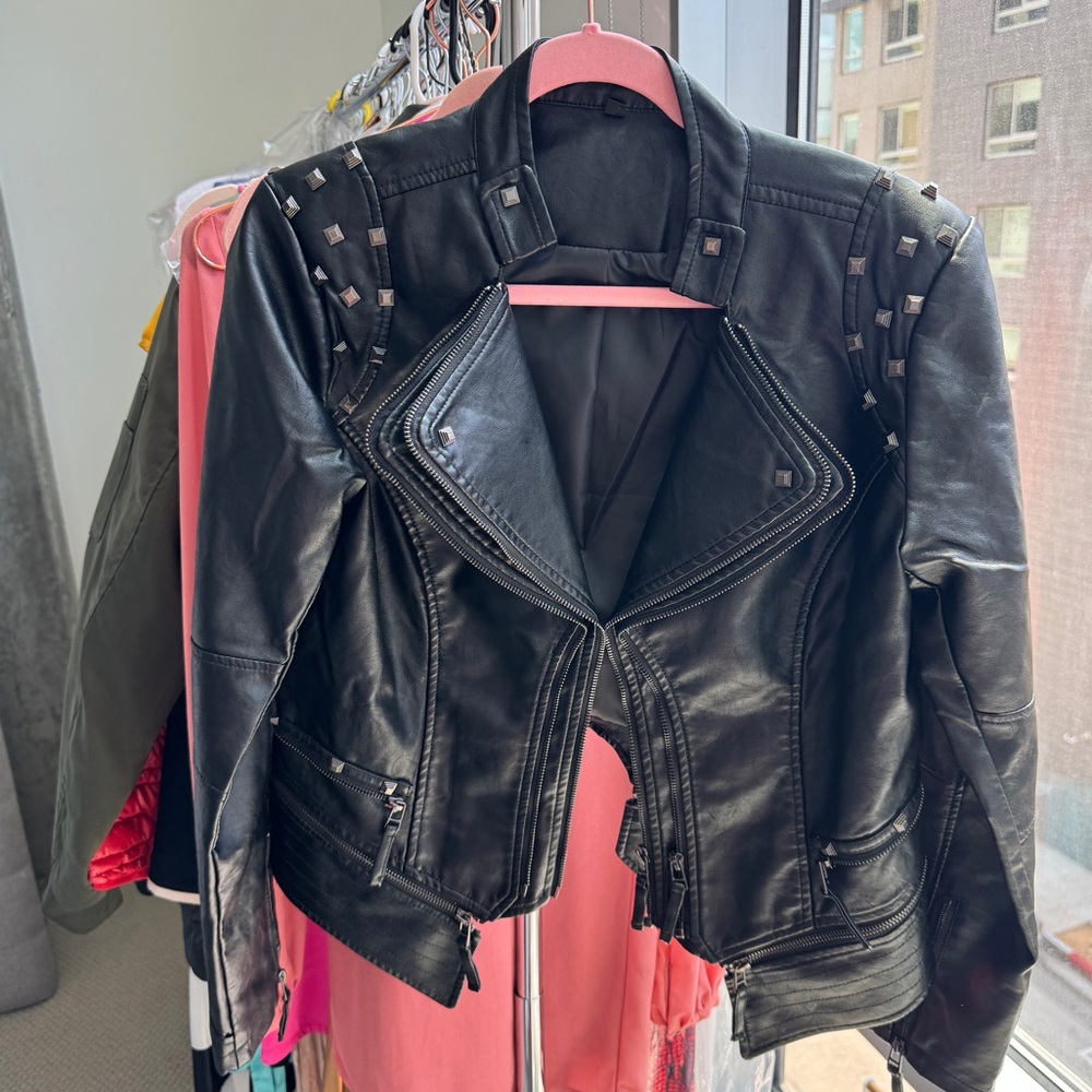 Black leather studded jacket NEW NEVER WORN.